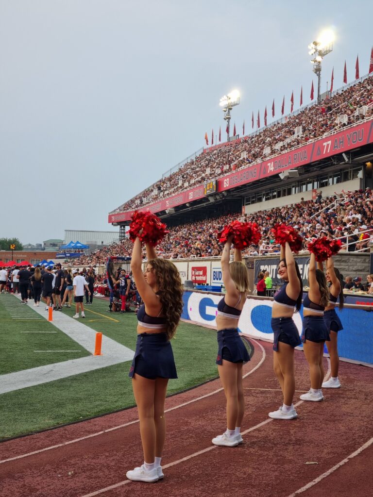 Cheerleaders at a football game in Percival Molson stadium