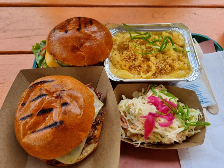 Burgers, mac and cheese and coleslaw from Aylwin restaurant in Atwater market food court