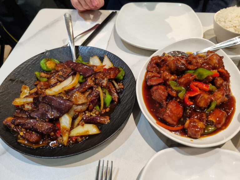 Stir-fried eggplants with minced pork and black beans and pork ribs in sweet and sour sauce from Chez Chili restaurant in Montreal's Chinatown